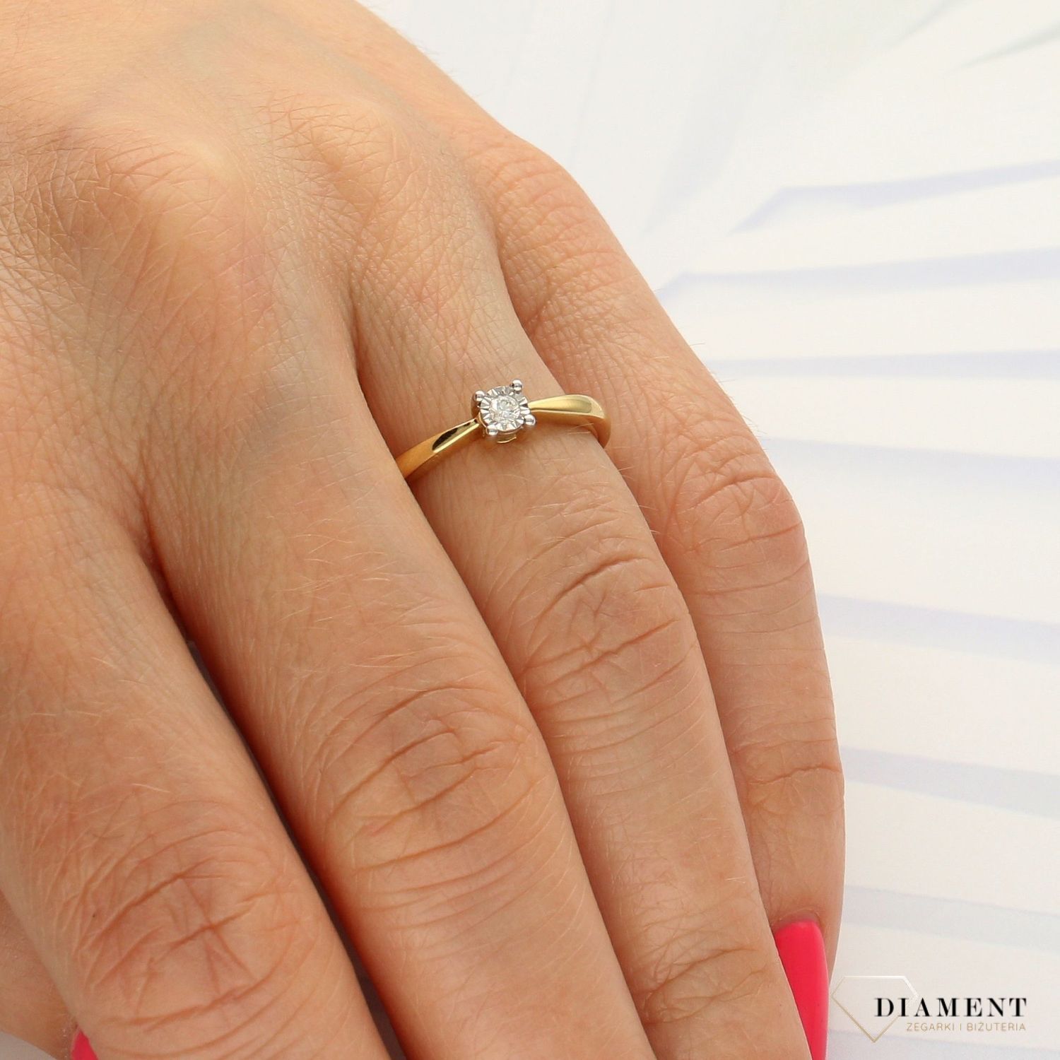 Pierścionek złoty DIAMENT, 585 diamenty wykonany ze złota próby 585 cer.693PD. Pierścionek z brylantem wielkości 0,04 ct, barwie H oraz czystości SI..jpg